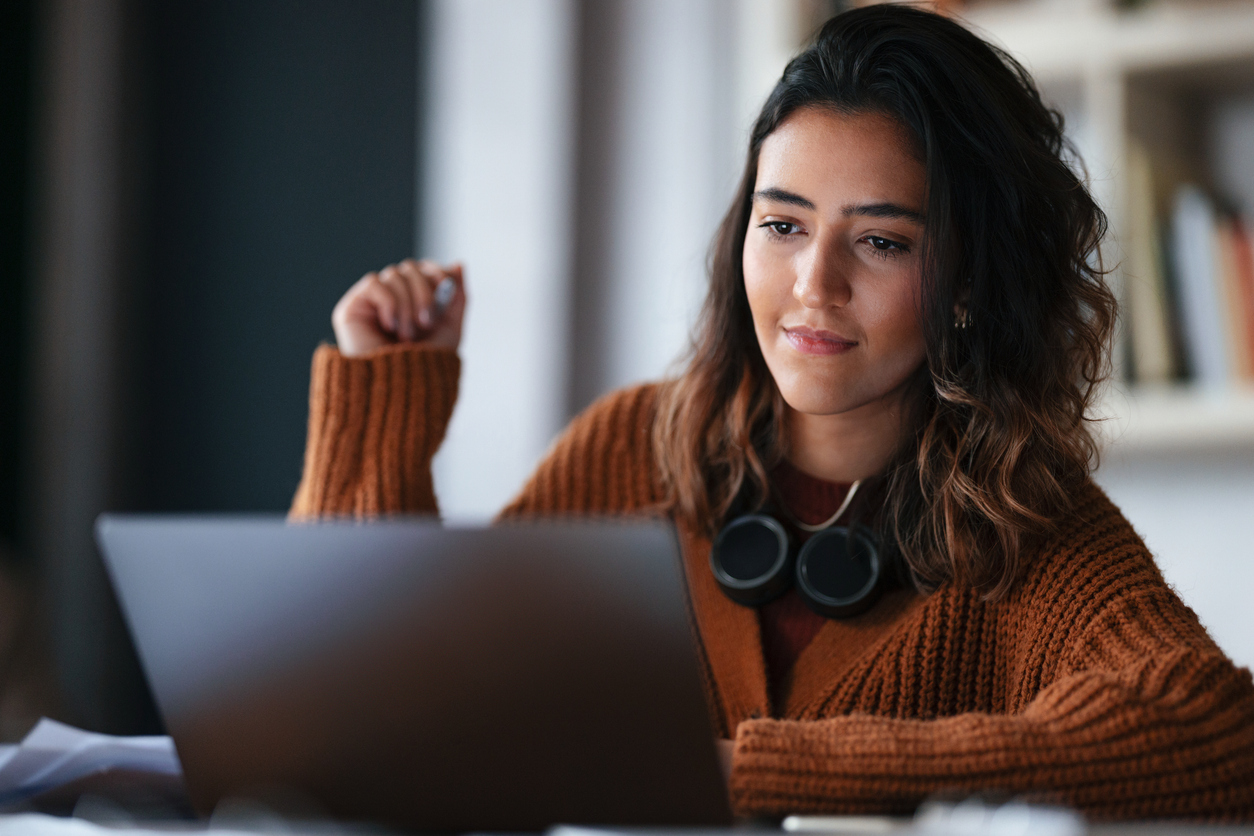 Adult student studying on a laptop